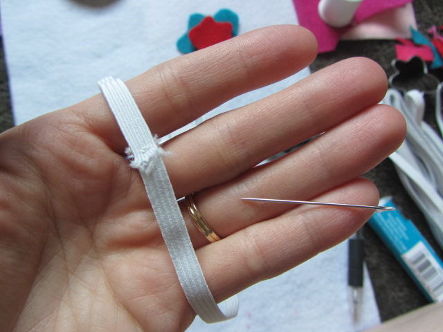 Sew together the ends of the elastic.  