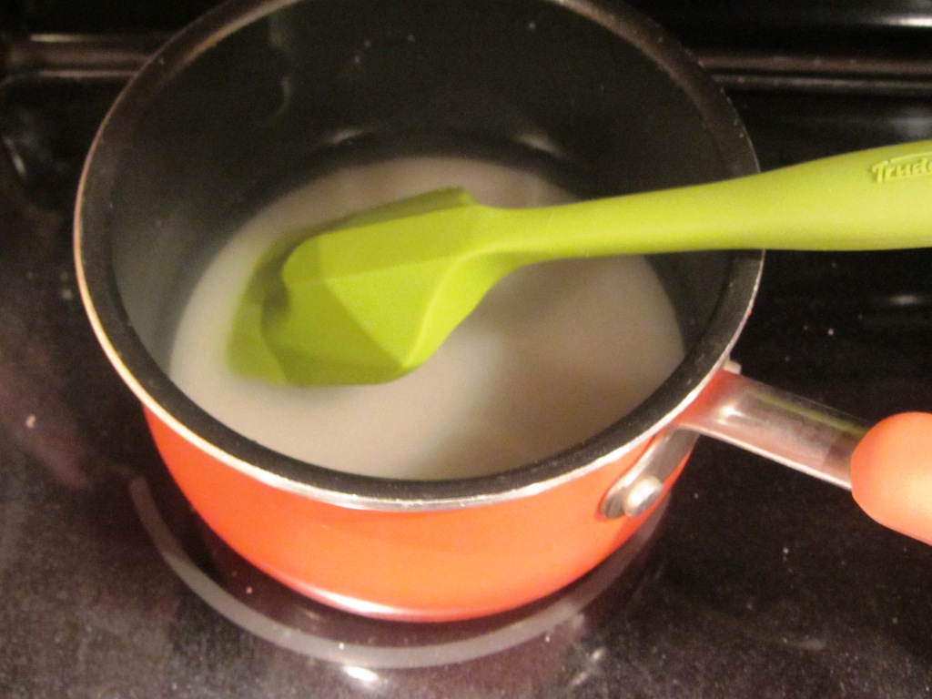 Add granulated sugar and water to a saucepan.