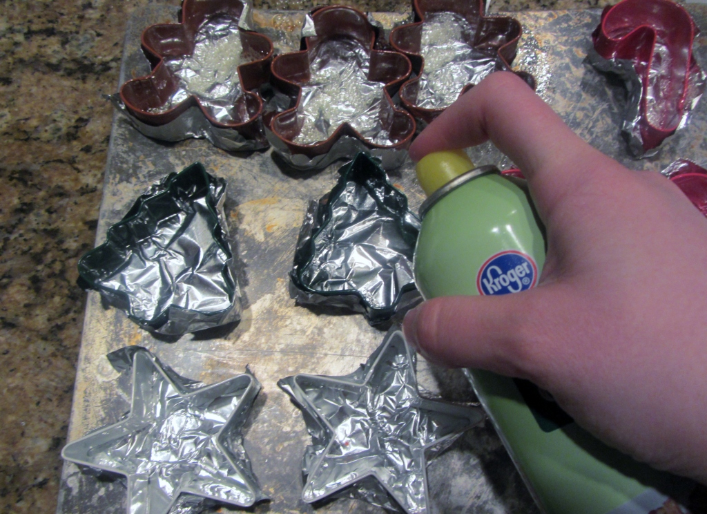Spray the insides of the cookie cutters with nonstick cooking spray.