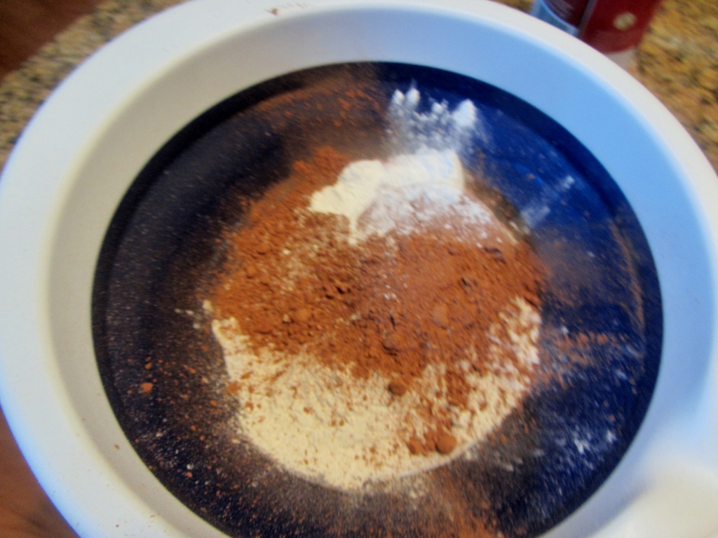 Add flour, cocoa powder, baking powder, & salt to a medium bowl.